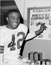 paul warfield points to paper